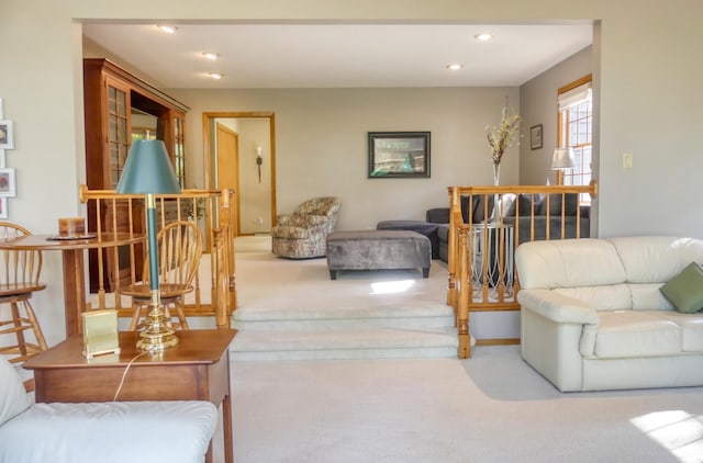 living room with light colored carpet