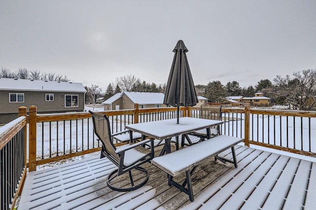 view of snow covered deck