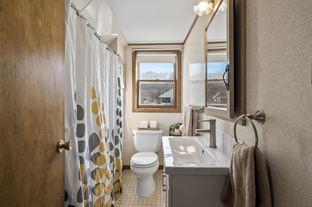 full bath with a shower with curtain, toilet, ornamental molding, tile patterned flooring, and vanity