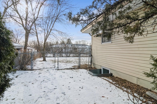 view of yard covered in snow