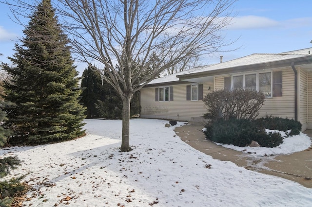 view of snow covered property