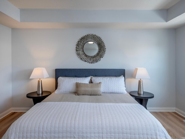 bedroom featuring hardwood / wood-style floors