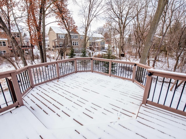 view of snow covered deck