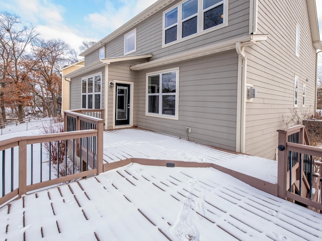 view of snow covered deck