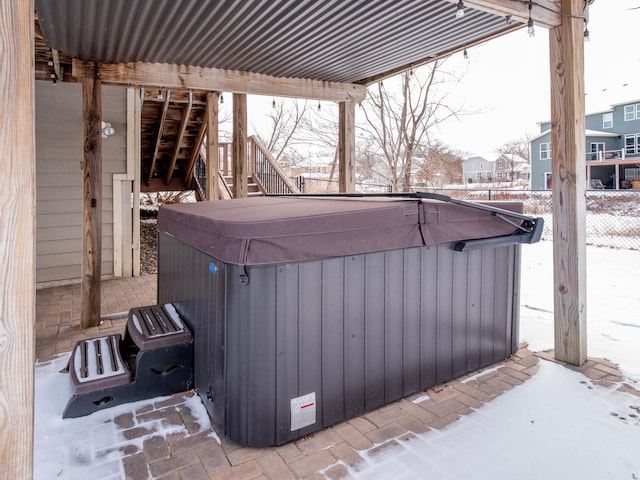 exterior space featuring a hot tub