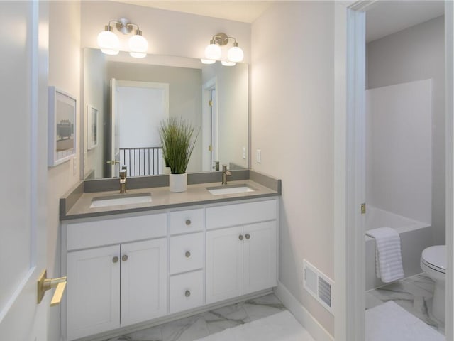 full bath featuring marble finish floor, visible vents, a sink, and toilet