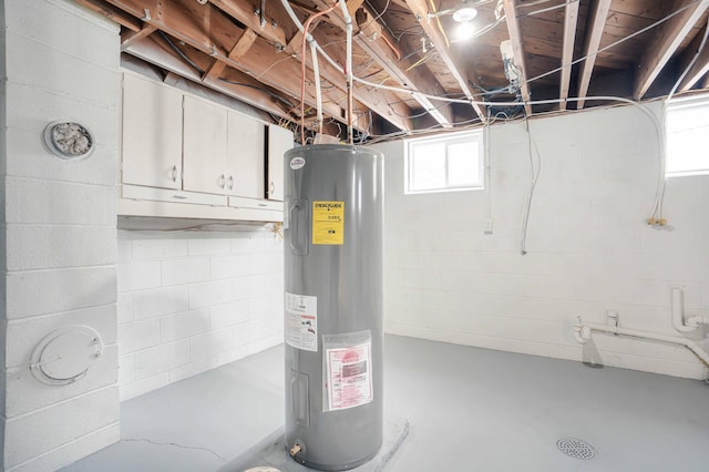 basement featuring electric water heater