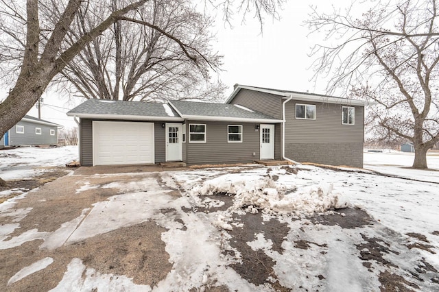 split level home with a garage