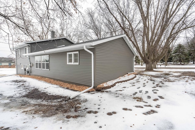 view of snow covered property