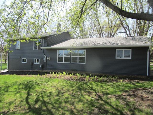53 Eastview Dr, Hancock, MN 56244 - back of house with a yard and a shingled roof