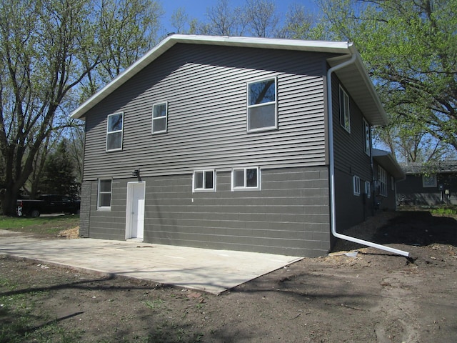 53 Eastview Dr, Hancock, MN 56244 - rear view of house featuring a patio