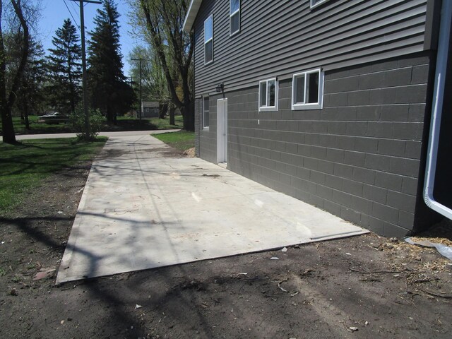 53 Eastview Dr, Hancock, MN 56244 - view of patio / terrace with concrete driveway