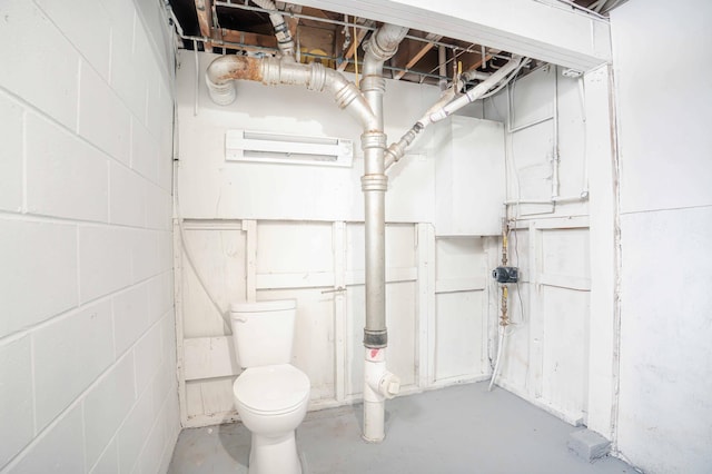 53 Eastview Dr, Hancock, MN 56244 - bathroom with concrete floors, concrete block wall, and toilet