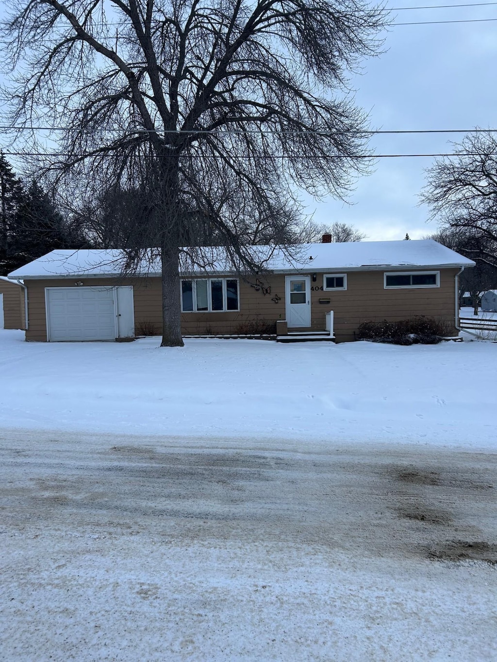 single story home with a garage