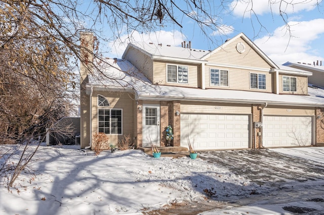 front facade with a garage