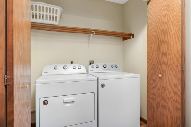 laundry room with washing machine and dryer