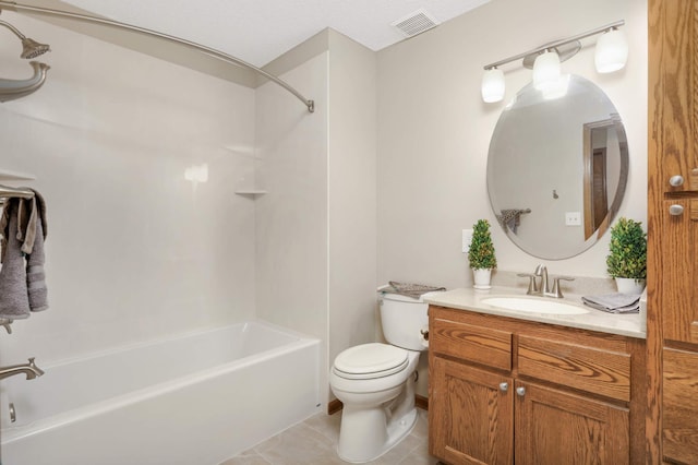 full bathroom featuring shower / bathing tub combination, tile patterned flooring, toilet, and vanity