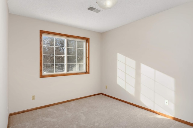 unfurnished room with carpet floors