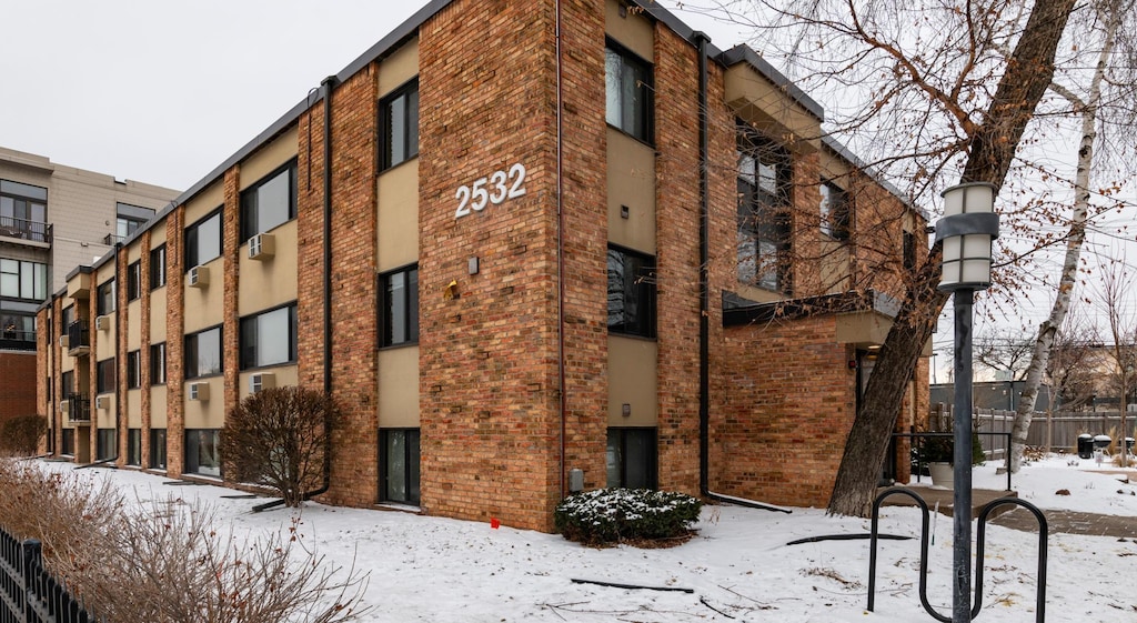 view of snow covered building