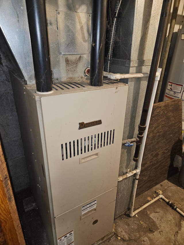 utility room with heating unit