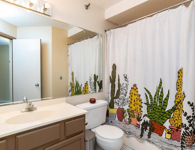 bathroom featuring toilet, a shower with shower curtain, a textured ceiling, and vanity