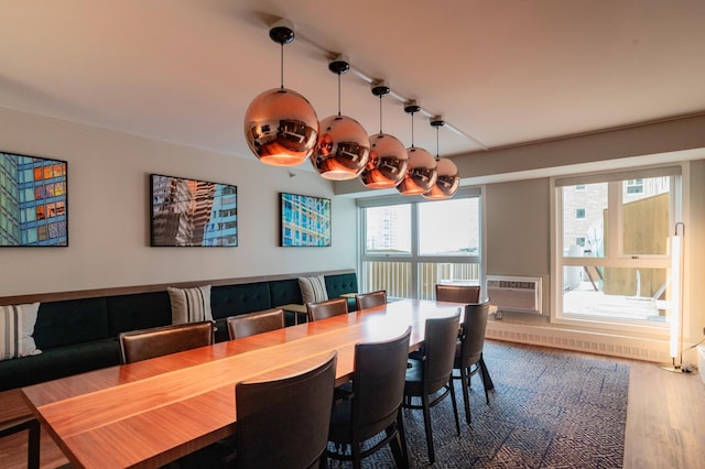 dining space featuring hardwood / wood-style floors