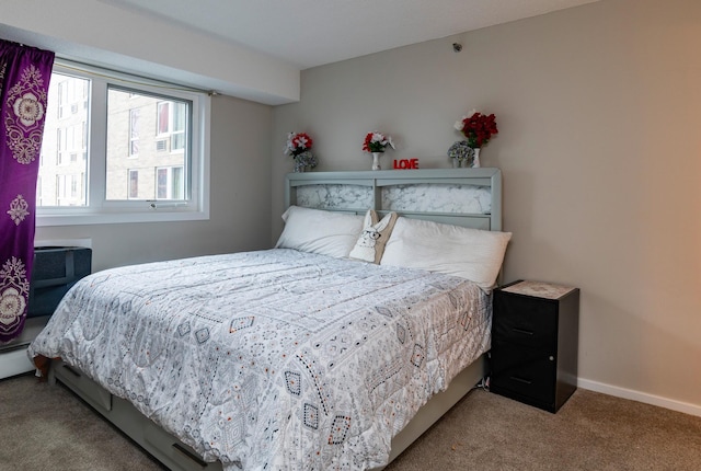 bedroom featuring light colored carpet