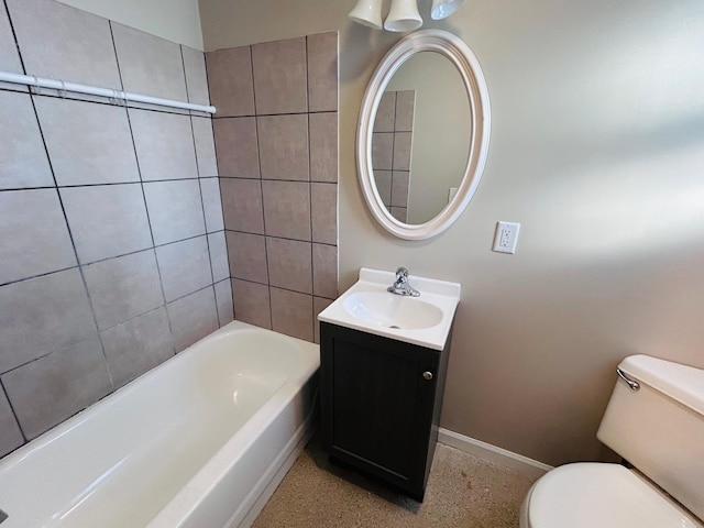 full bathroom featuring toilet, vanity, and tiled shower / bath