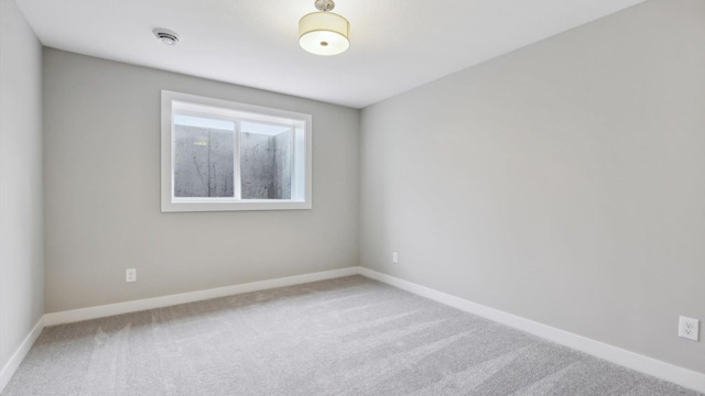 empty room featuring carpet flooring