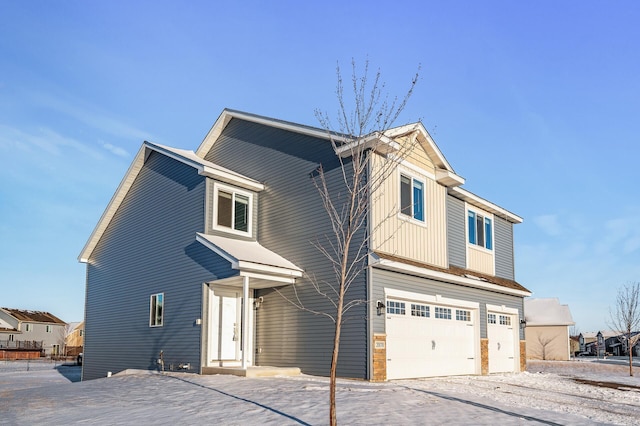 view of front of property with a garage