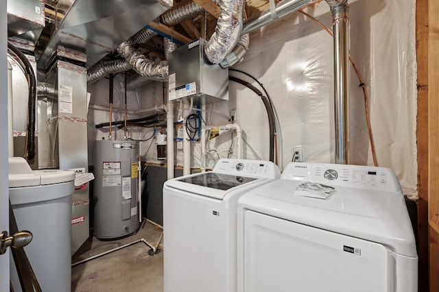 laundry room featuring separate washer and dryer and water heater