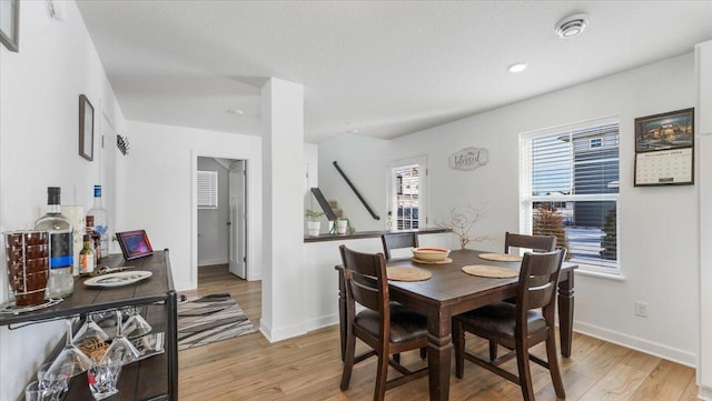 dining room featuring light wood-type flooring