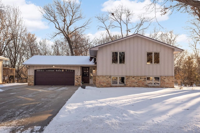 split level home with a garage