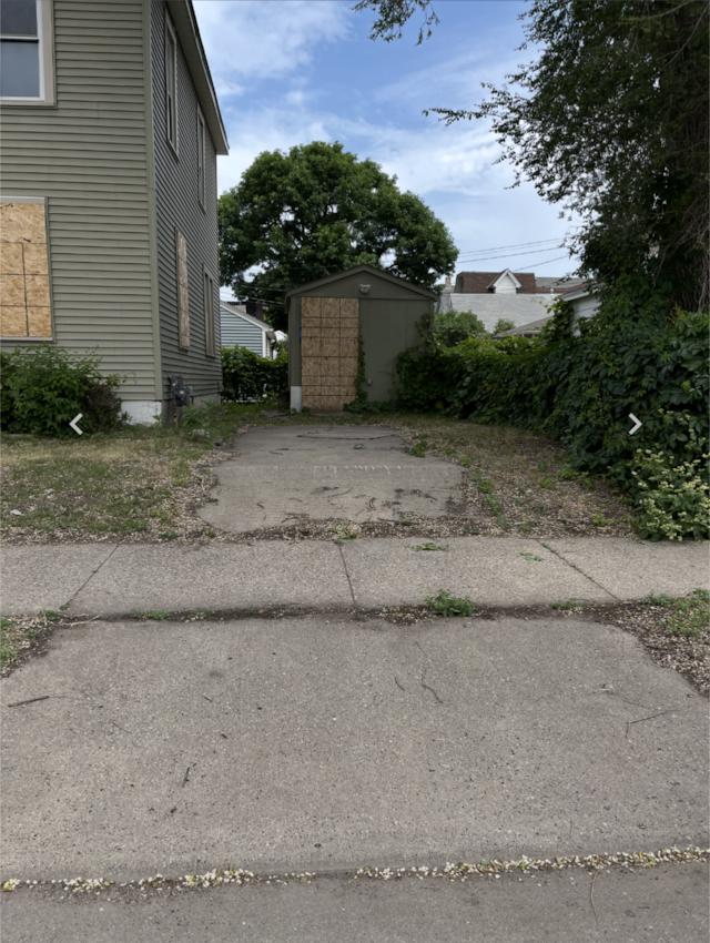 view of property exterior featuring a shed