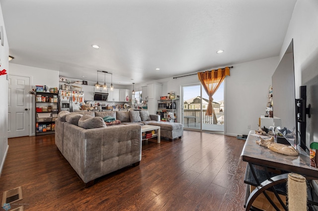 living room with dark wood-type flooring