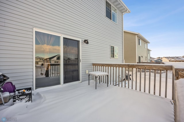 view of snow covered deck