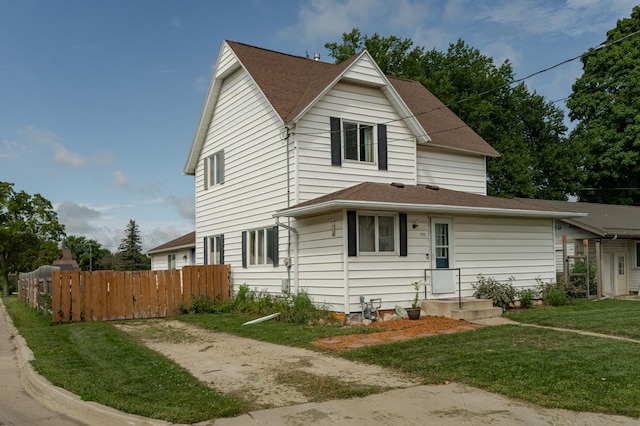 view of front of home with a front yard