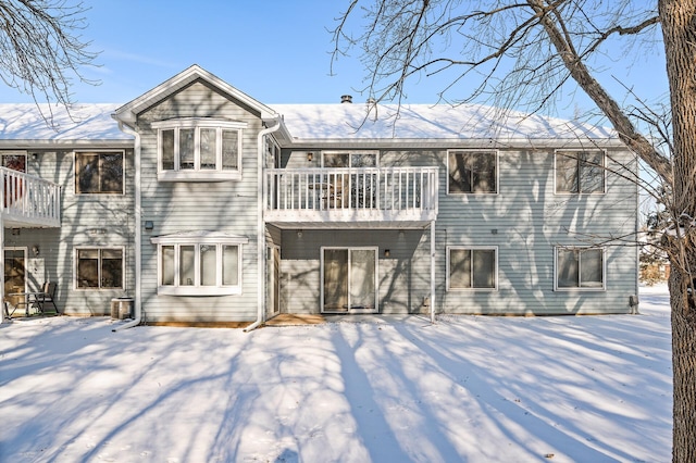 view of snow covered house