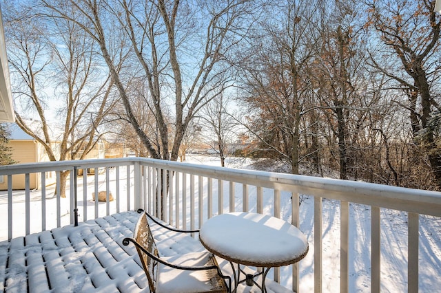 view of snow covered deck