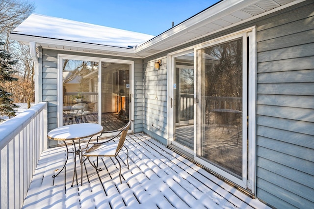 view of snow covered deck