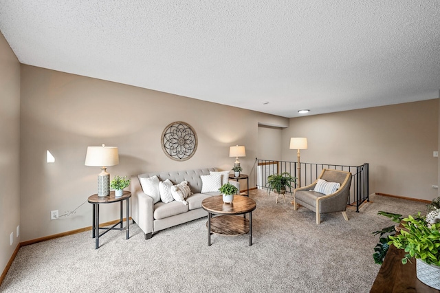 carpeted living room with a textured ceiling