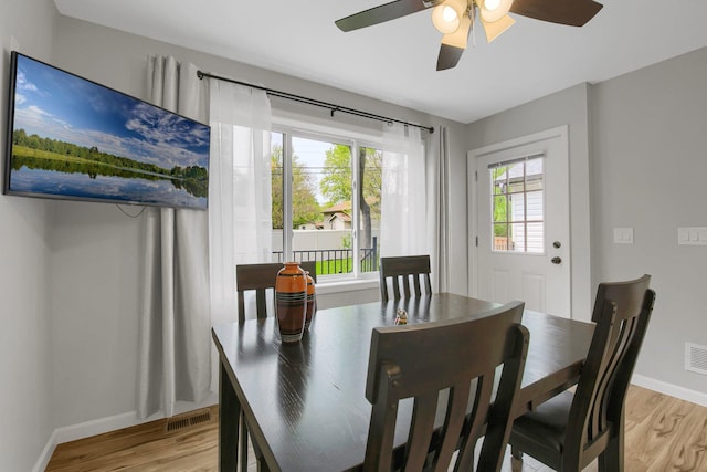 dining room featuring ceiling fan and light hardwood / wood-style floors