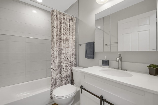 full bathroom featuring toilet, vanity, and shower / bath combo