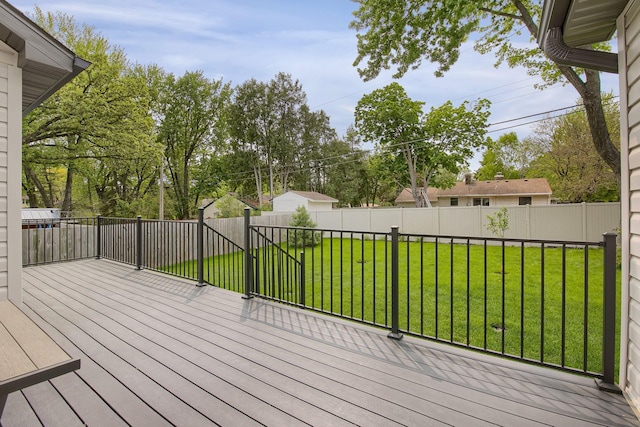 wooden deck with a yard