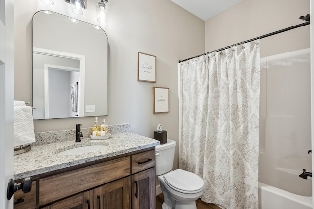 full bathroom featuring vanity, toilet, and shower / bath combo