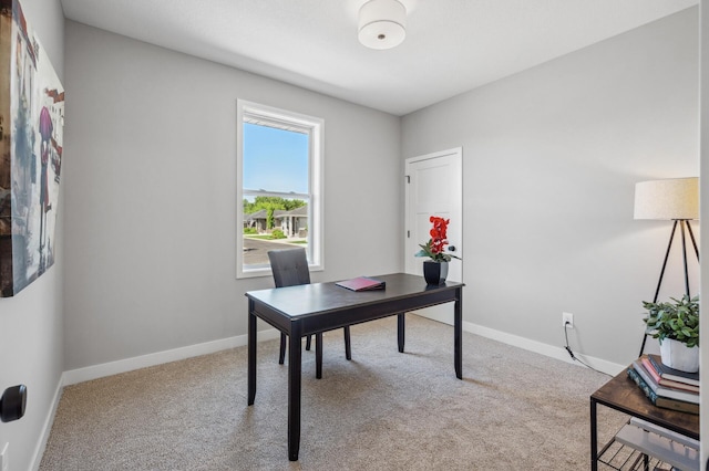 view of carpeted home office