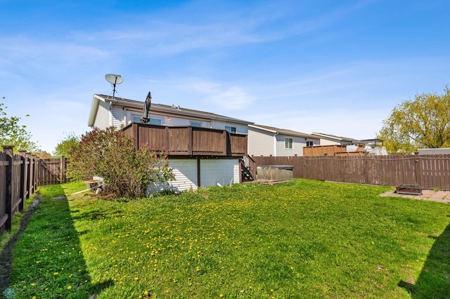 view of yard featuring a wooden deck