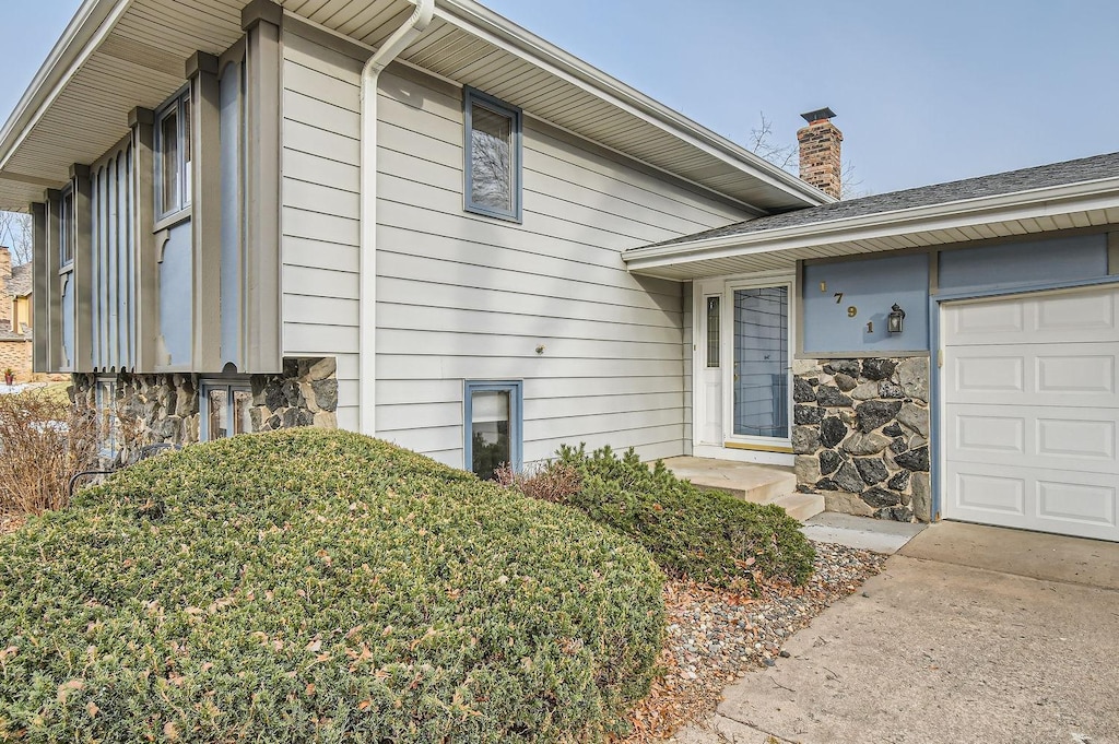 entrance to property with a garage