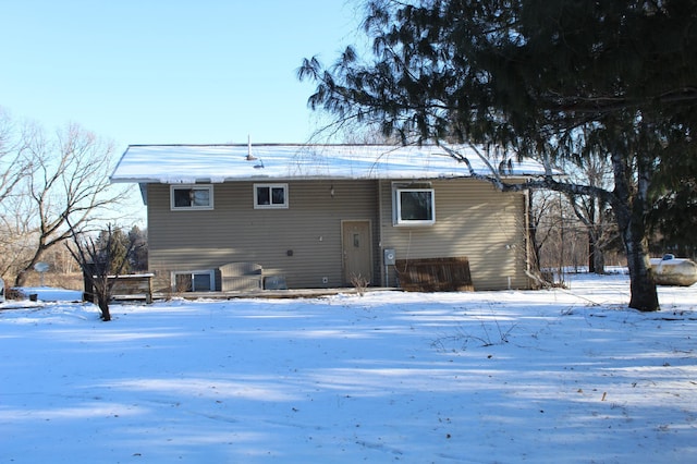 view of snow covered house