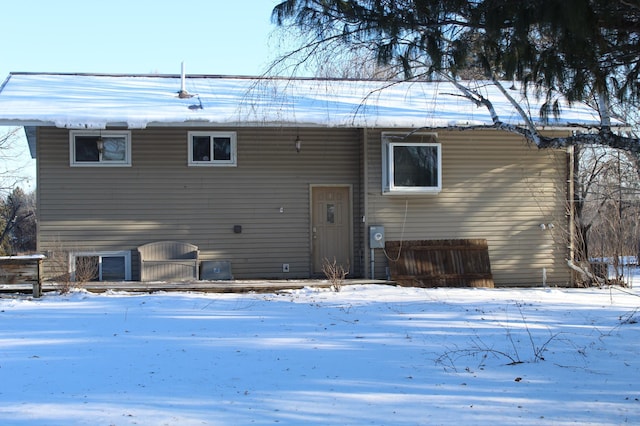 view of snow covered house